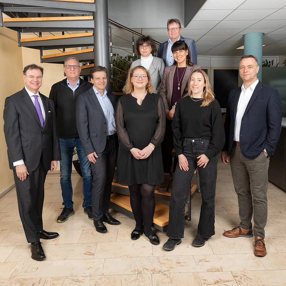 Aufsichtsrat der BGC Gruppenbild vom Aufsichtsrat im Hintergrund eine Wendeltreppe